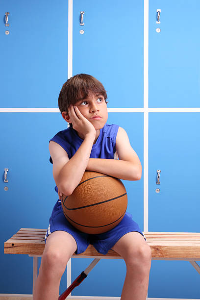 istock Young Basketball Alone In The Locker Room 155395970
