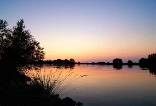 Sunset at the river IJssel near Kampen in The Netherlands.