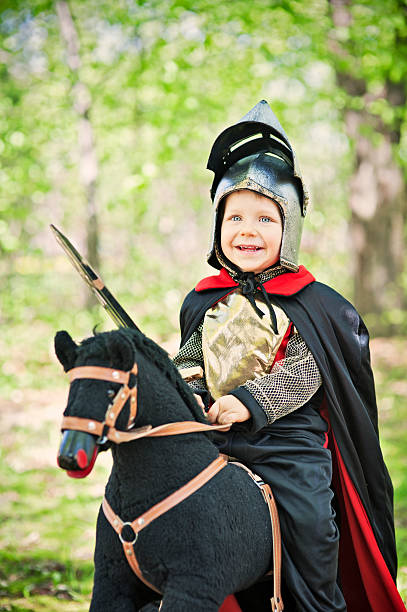istock Little knight riding through the woods 155396183