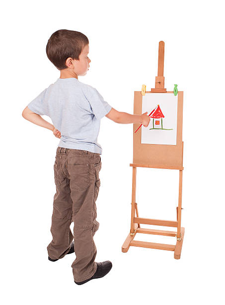boy 塗装ハウスオンイーゼル - artists canvas indoors childhood small ストックフォトと画像