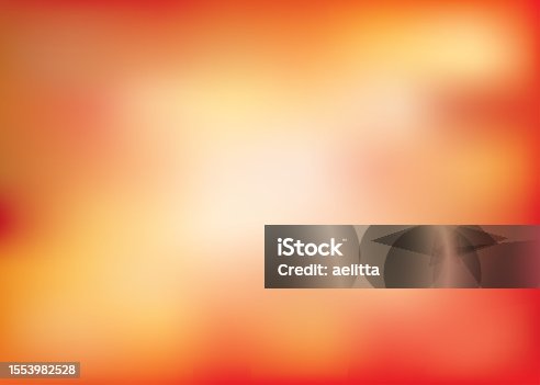 istock Abstract defocused orange-red-yellow background. 1553982528
