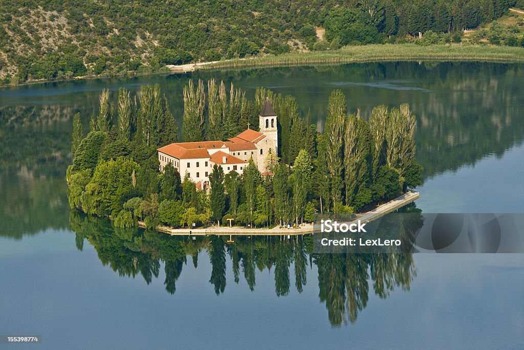 Isola e Monastero Visovac - Foto stock royalty-free di Abbazia