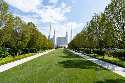 Washington DC Mormon Temple also known as the temple of the Church of Jesus Christ of Latter-day Saints on a clear sunny day.