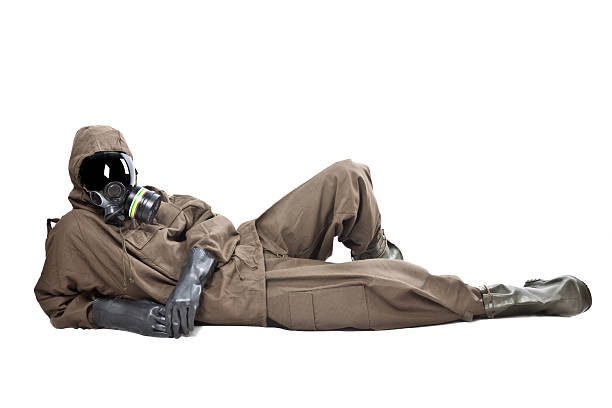 Man in Hazard Suit layng on the ground