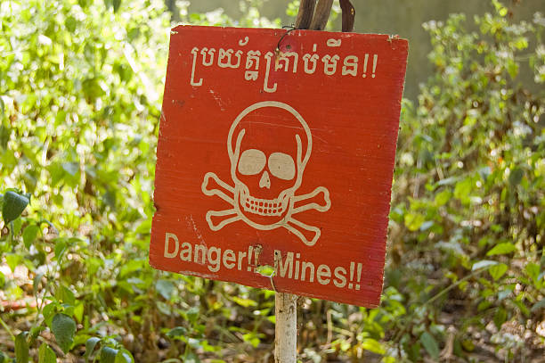 istock Cambodian landmine warning sign 155401916