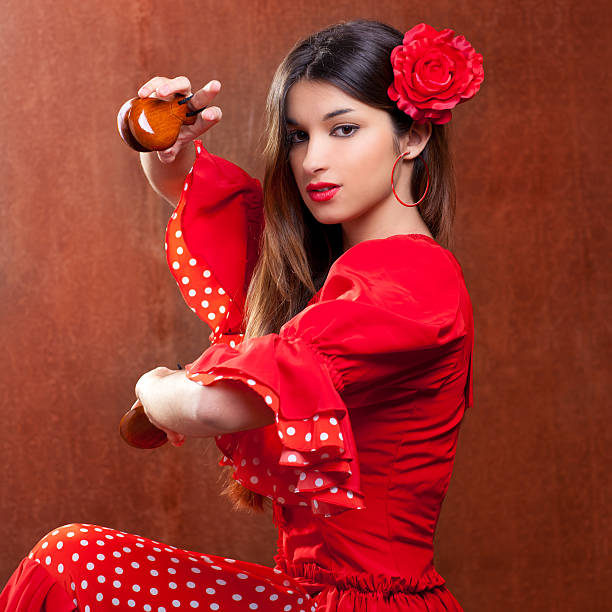 Castanets gipsy flamenco dancer Spain girl Castanets gypsy flamenco dancer Spain girl with red rose castanets stock pictures, royalty-free photos & images