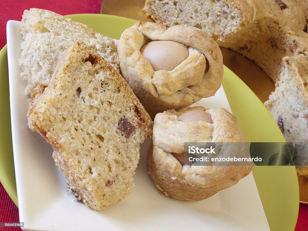 casatiello - neapolitan food casatiello - neapolitan food  Typical Neapolitan Easter baked goods with eggs and sausages and cheese cubes. Casatiello Stock Photo