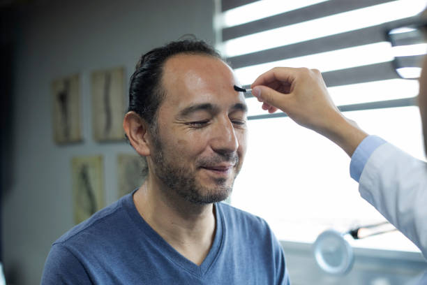 istock Neurologist consulting with male patient 1554042070