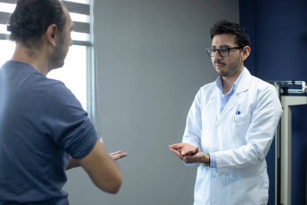 istock Neurologist consulting with male patient 1554044250