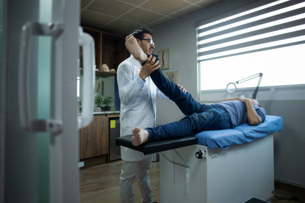 istock Neurologist consulting with male patient 1554044776