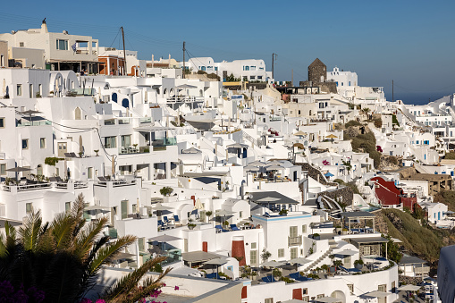 Imerovigli, Santorini, Greece - June 29, 2021: Whitewashed houses in Imerovigli on Santorini island, Cyclades, Greece