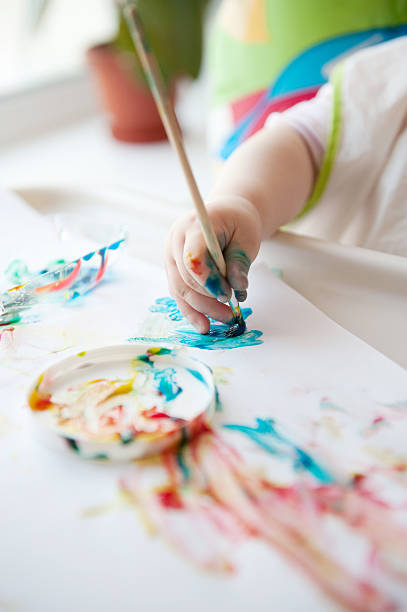 istock Baby painting 155410704