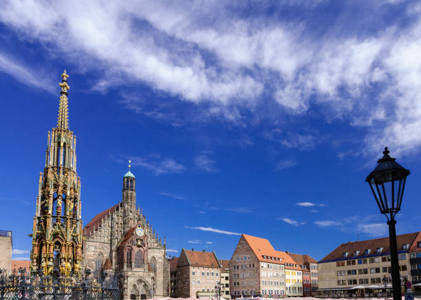 The Hauptmarkt in Nuremberg with the Beautiful Fountain (Schöner Brunnen) and Church of our Lady (Frauenkirche)