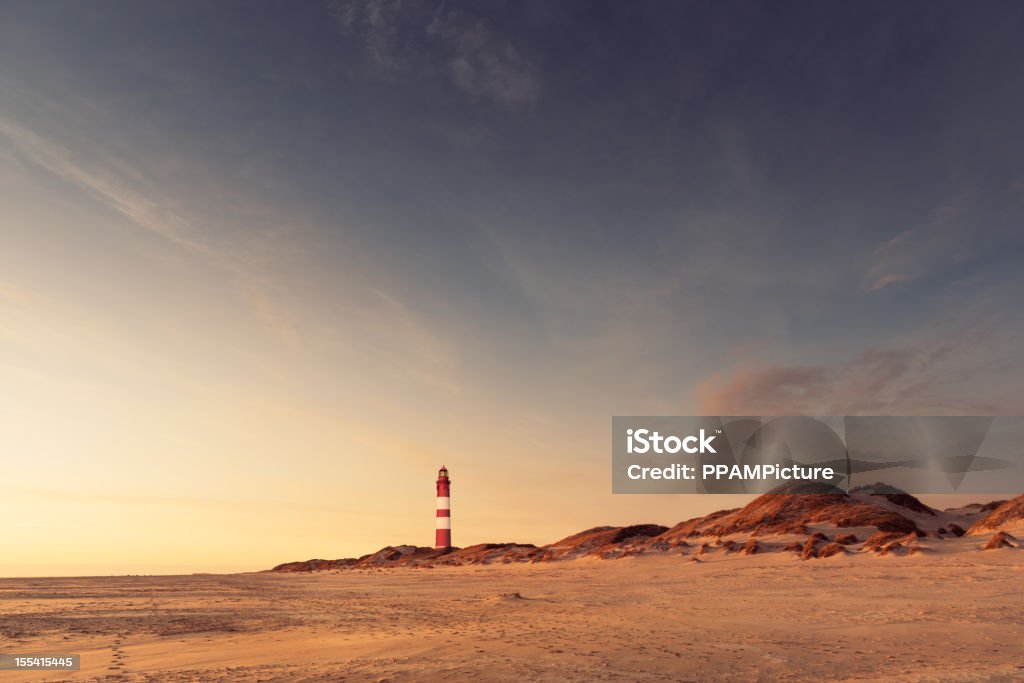 Lighthouse in the dunes  Lighthouse Stock Photo