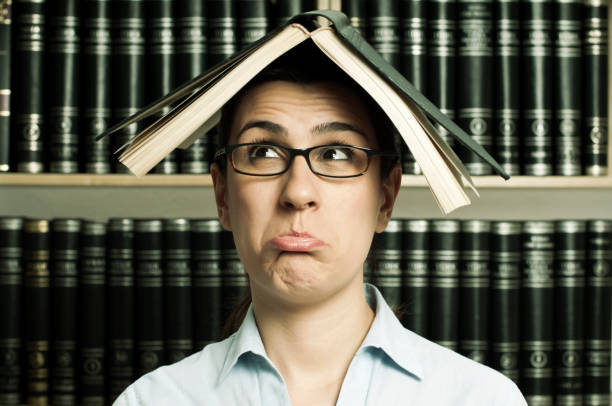 istock woman in the library 155415502