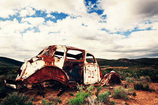 istock Rusty car abandoned in the middle of nowhere 155415545