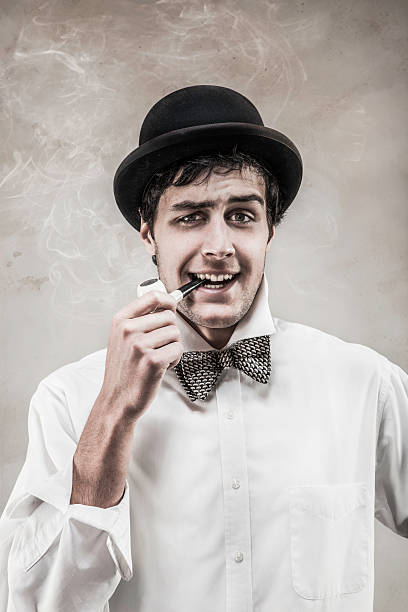 istock Confident Young Retro Man in Bow Tie and Bowler Hat 155416176