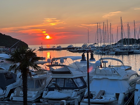 Sunset in the Croatia in a port with boats and ships