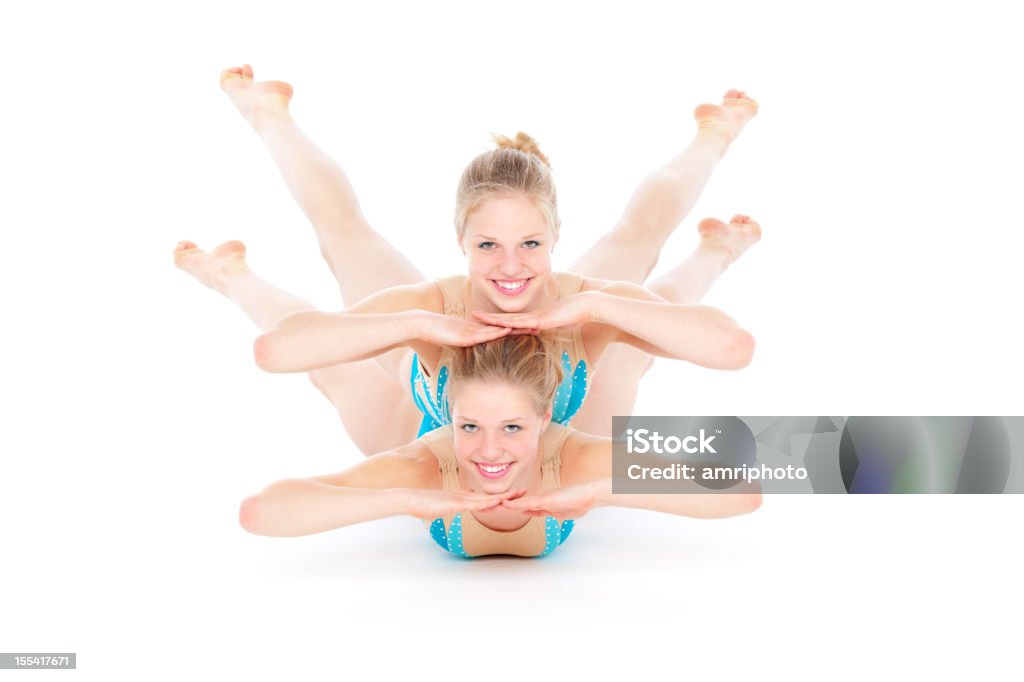 Latający synchron acrobatic dziewczyny - Zbiór zdjęć royalty-free (14-15 lat)