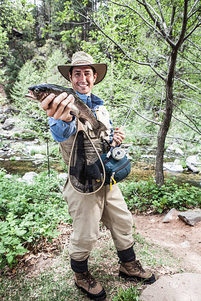 istock Fly fishing catch 155417736