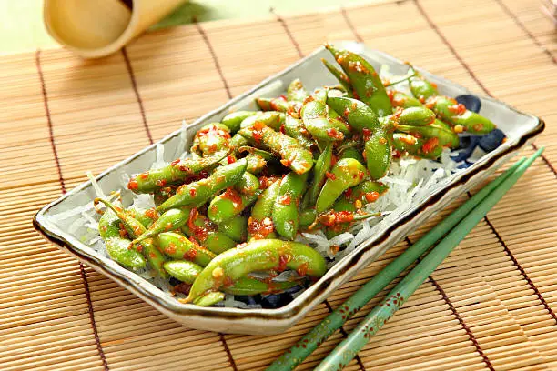 Appetizer Edamame soybeans with chopped garlic and Chili pepper