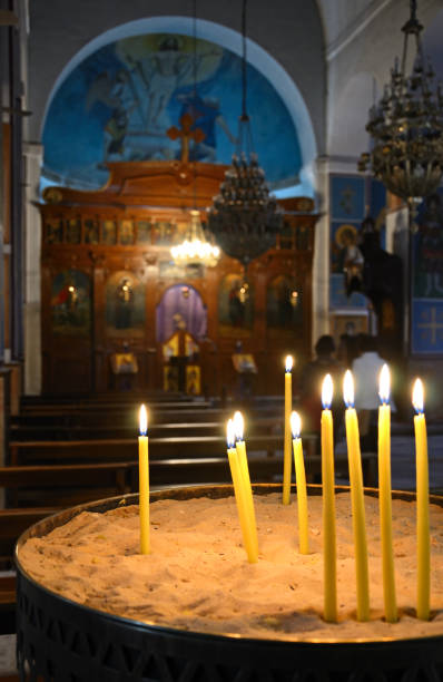 istock Candles in a church 155418289
