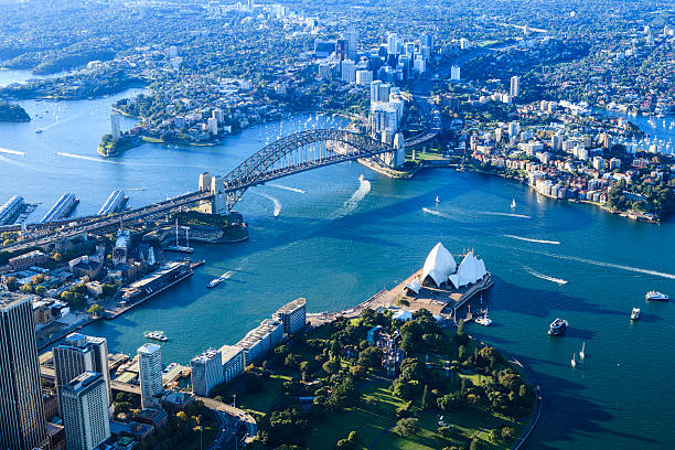 Sydney harbor panorama Sydney harbor in panorama view - aerial shot sydney harbor photos stock pictures, royalty-free photos & images