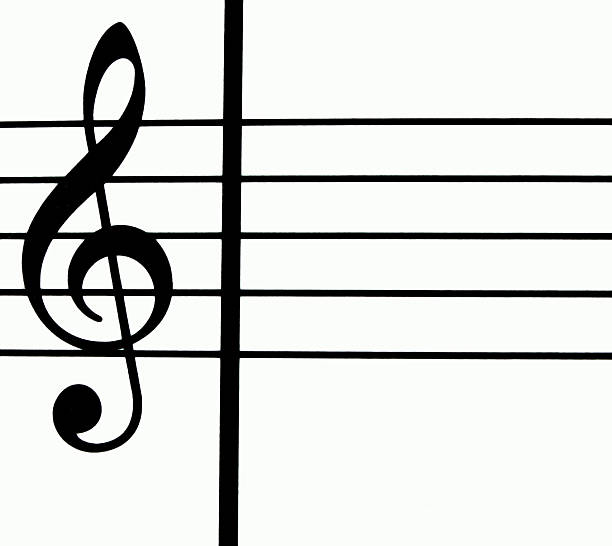 Treble clef on an old music score. Treble clef is made of Medium-density fibreboard and is on a music score from Bach's Art of Fugue published in Leipzig c. 1750 and is in public domain.  Ideal image for musical themes. It is an exclusive image and it can only be found in iStockphoto.