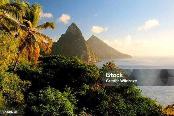 St Lucias Twin Pitons Lit By Sunset Glow Stock Photo - Download Image Now - Saint Lucia, Pitons, Beauty