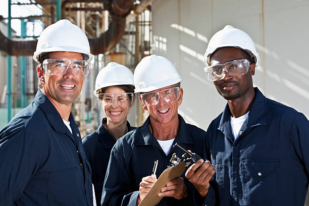 istock Diverse group of workers at manufacturing plant 155418952