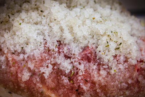 Salting in progress on prosciutto during the aging process. This ham is a product of St. Rhémy En Bosses in Valle d'Aosta, the smallest and least populous region of Italy. 