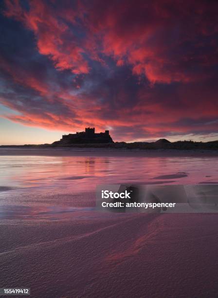 Bamburgh Castle Sunrise Stock Photo - Download Image Now - Bamburgh Castle, Beach, Coastline