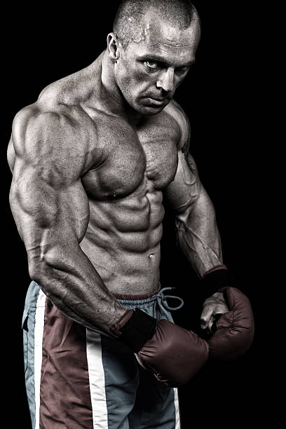 istock Powerful fighter portrait-isolated on black background 155419952