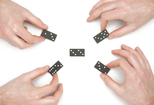 Teamwork domino concepts: adding different ideas to common project