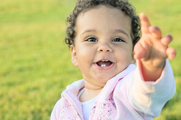 istock Happy Smiling Baby Girl (1-2) 155420064
