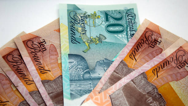 New Egyptian banknote New Egyptian banknote isolated on white background british falling pounds stock pictures, royalty-free photos & images
