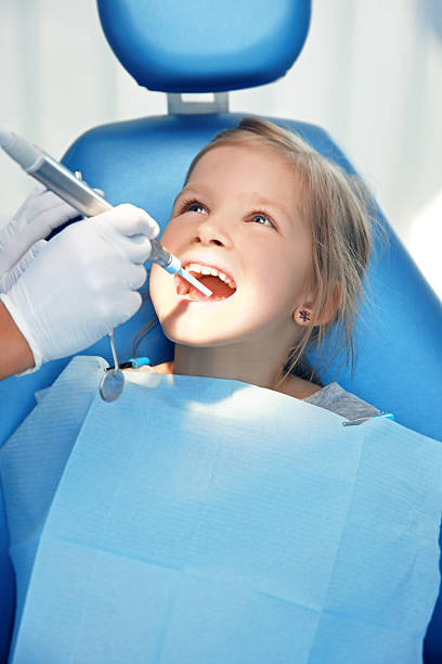 歯科 - child smiling human teeth dental hygiene ストックフォトと画像