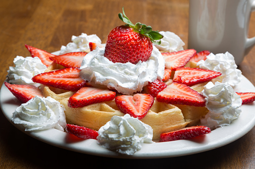 Belgian Waffle with Strawberries and Whipped Cream