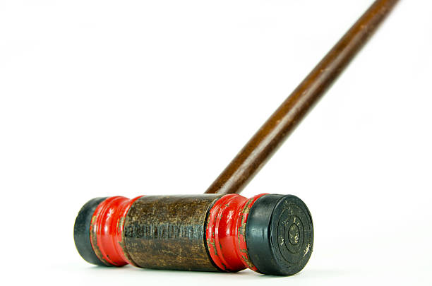 Croquet mallet and balls isolated on white background. Traditional british game. 3d render