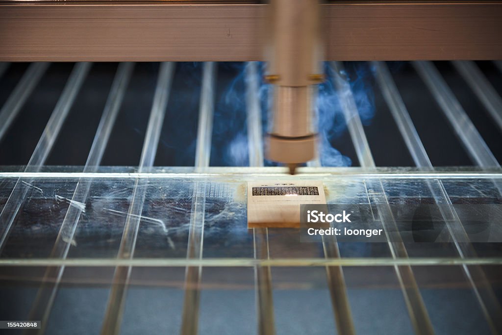 laser engraving máquina cuting O texto padrão - Foto de stock de Laser royalty-free