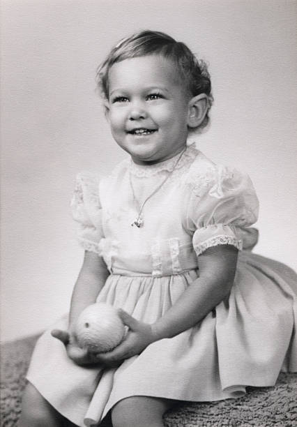vintage sepia baby girl formal portrait - 嬰兒 圖片 個照片及圖片檔