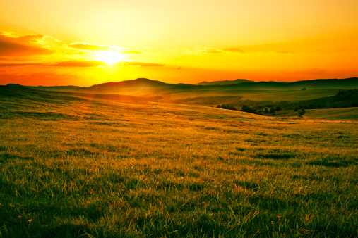 Beautiful mounatain meadow sunset