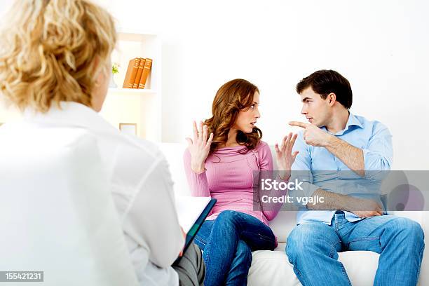 Couple Arguing At Counselor Stock Photo - Download Image Now - Arguing, Three People, 30-39 Years