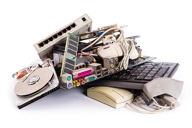computer parts heap of electronic and computer hardware waste for disposal or recycling - junked computer parts e waste photos stock pictures, royalty-free photos & images