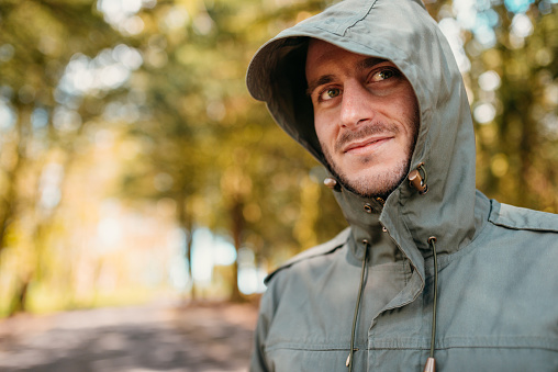 portrait of a man with a rain jacket
