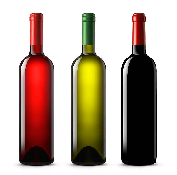 Three wine bottles in various colors on a white background Quality wine bottles. Red,white and rose wine. wine bottle photos stock pictures, royalty-free photos & images