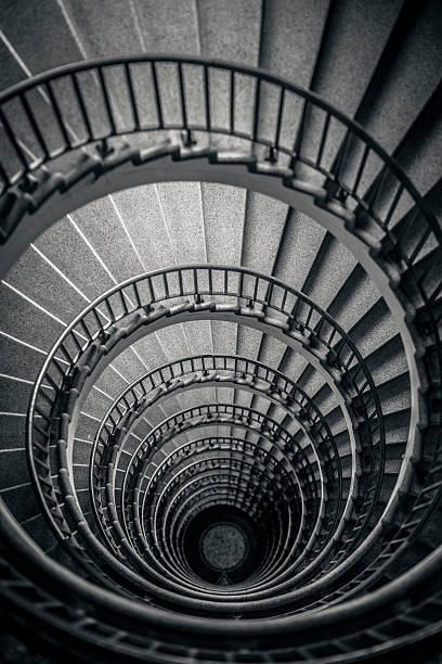 istock Old spiral stairway from above 155421759