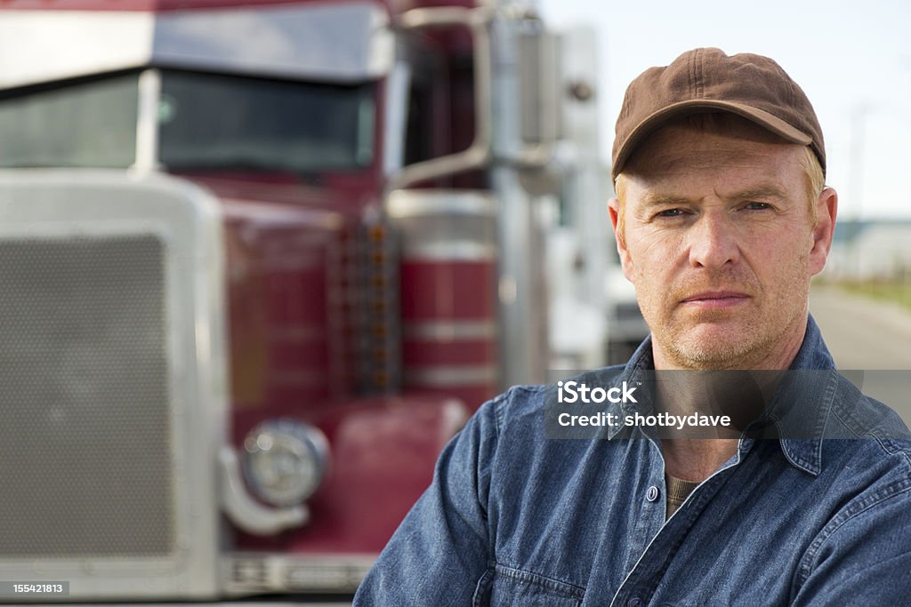 Red Truck and Driver  Truck Driver Stock Photo