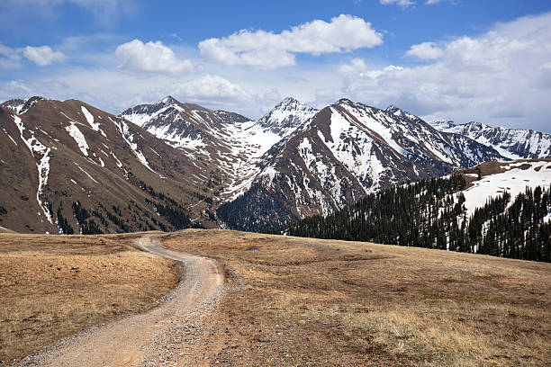 istock rocky mountain road trip landscape 155422132