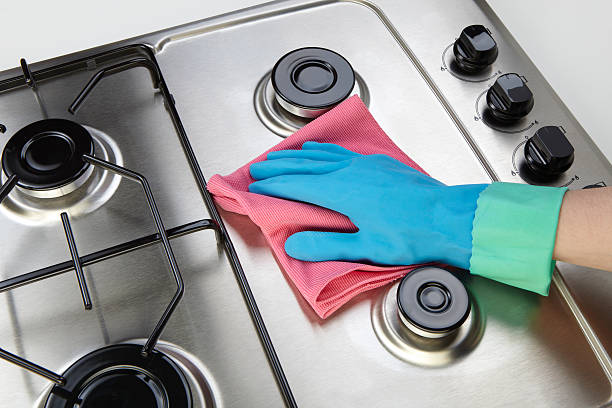 istock Cleaning set-top stove 155422360